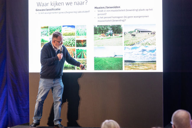 Speaker explains crop classification and mowing/grazing during the nGLB final presentation